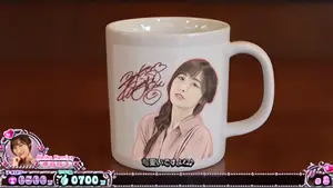 サイン入りマグカップ
